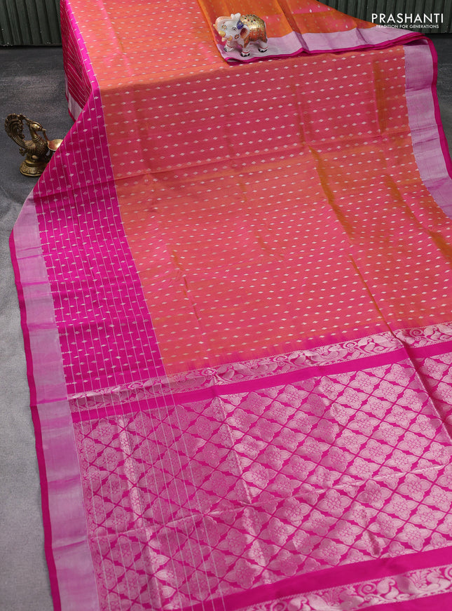 Pure uppada silk saree dual shade of yellowish pink and pink with allover silver zari woven butta weaves and long zari woven border