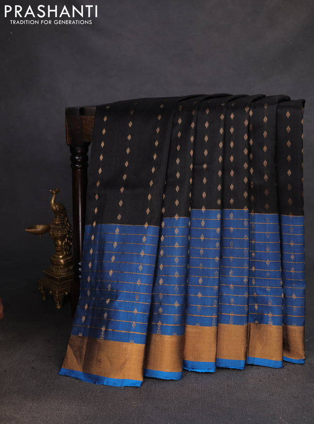Pure uppada silk saree black and cs blue with allover zari woven butta weaves and long zari woven border