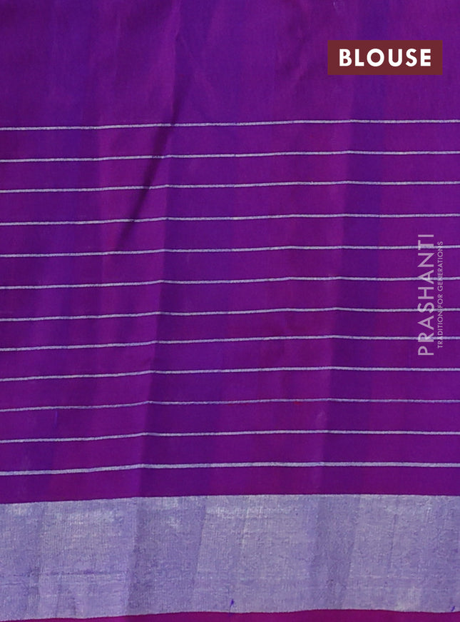 Pure uppada silk saree dual shade of bluish green and purple with allover silver zari woven butta weaves and silver zari woven border