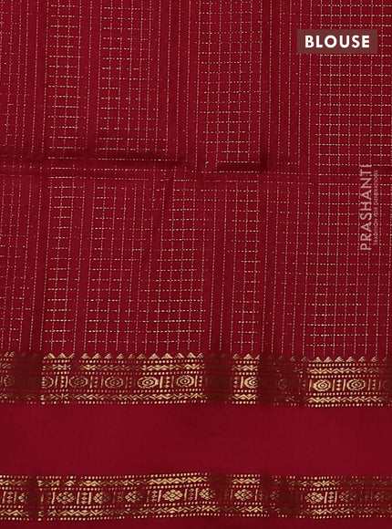 Pure soft silk saree bottle green and pink with allover zari woven small checked pattern and rettapet zari woven border
