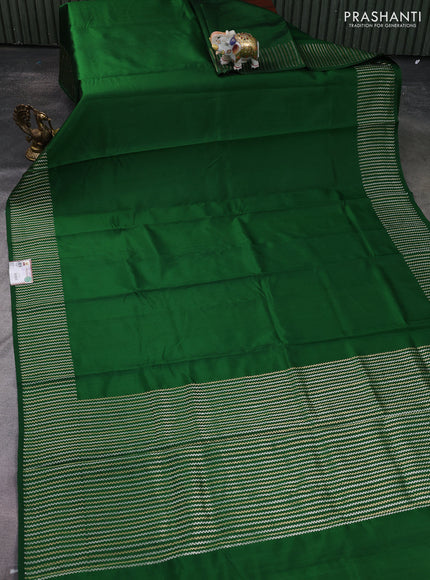 Banarasi poona silk saree green with plain body and zari woven border