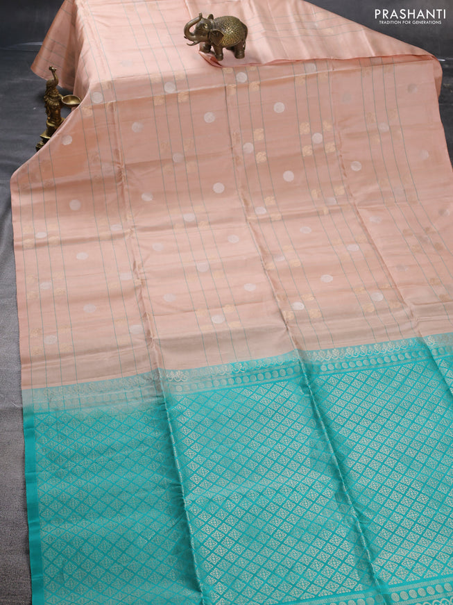 Pure soft silk saree pastel peach and teal green with allover checks & zari buttas in borderless style