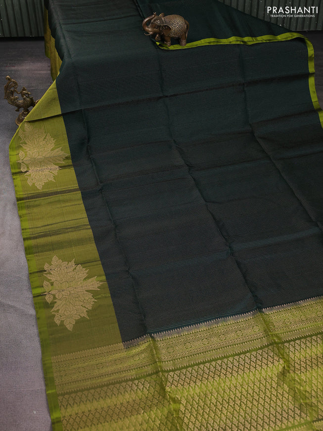 Pure soft silk saree bottle green and light green with allover zari weaves and long floral zari woven border