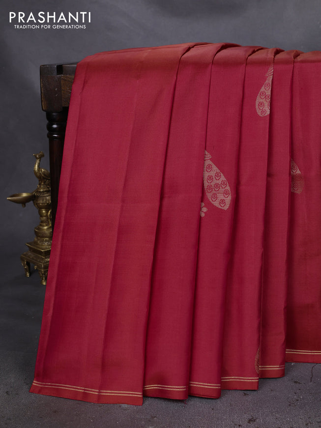 Pure soft silk saree dual shade of pinkish orange with parrot zari woven buttas and small zari woven border