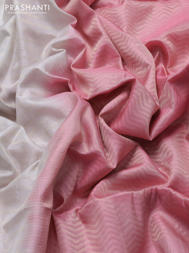 Pure soft silk saree off white and light pink with allover zari woevn brocade weaves and long zari woven border