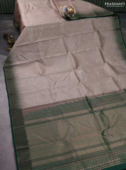Pure soft silk saree grey and green with copper zari woven buttas and copper zari woven border