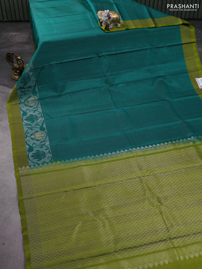 Pure soft silk saree teal green and light green with allover silver zari strip pattern and silver zari woven border