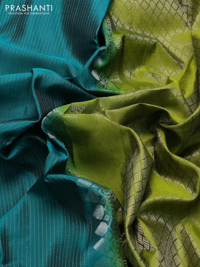Pure soft silk saree teal green and light green with allover silver zari strip pattern and silver zari woven border