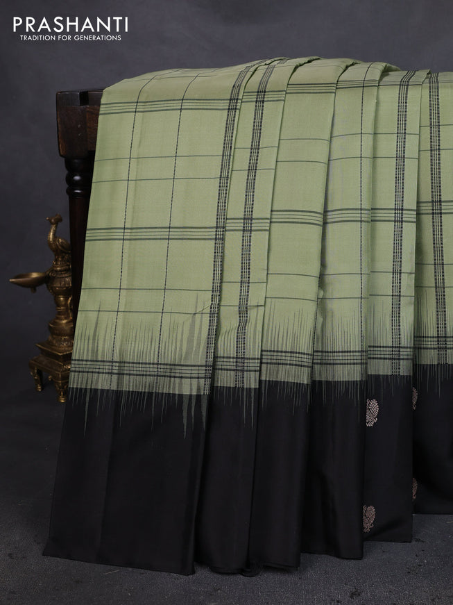 Pure soft silk saree pastel green and black with allover checked pattern and zari woven butta border