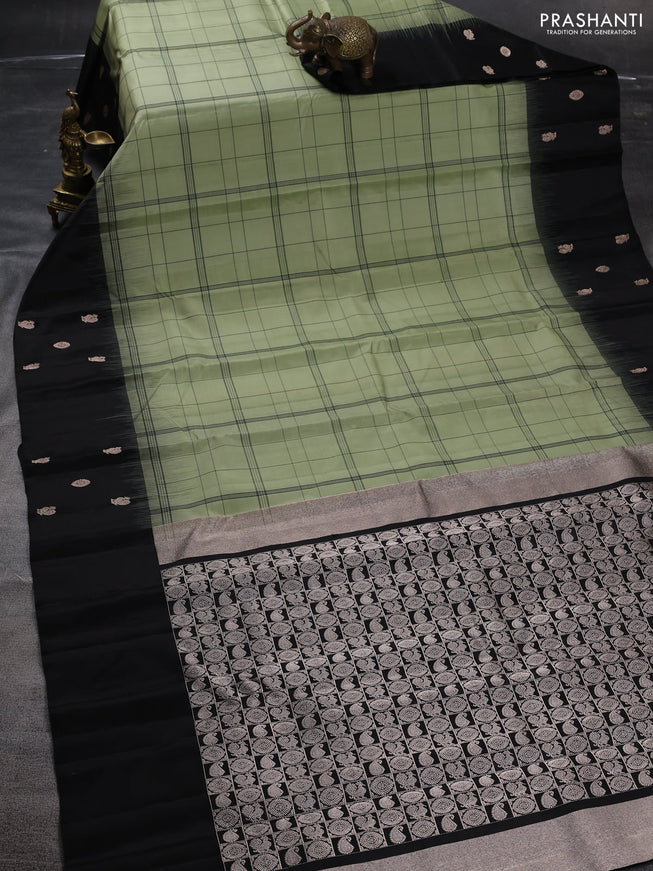Pure soft silk saree pastel green and black with allover checked pattern and zari woven butta border
