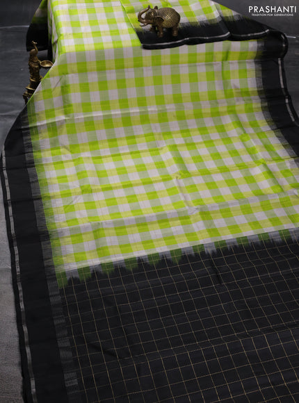Pure soft silk saree light green off white and black with allover zari checked pattern and rettapet zari woven border