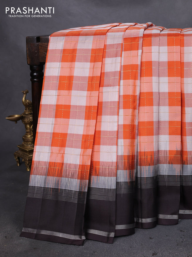 Pure soft silk saree orange off white and deep wine shade with allover zari checked pattern and rettapet zari woven border