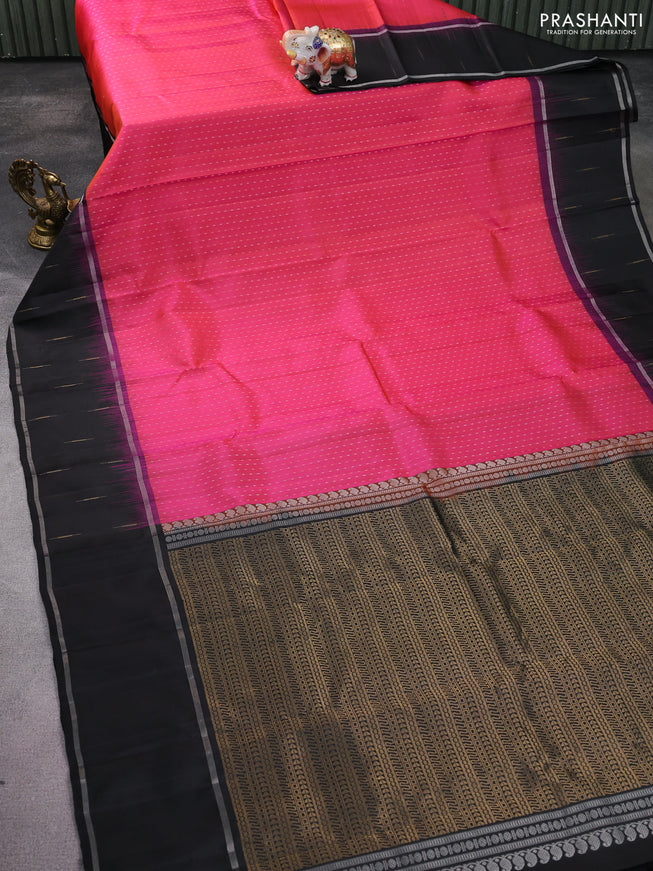 Pure soft silk saree dual shade of pinkish orange and black with allover silver & gold zari woven butta weaves and long zari woven butta border