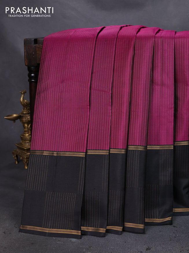 Pure soft silk saree magenta pink and black with allover zari woven strip pattern and long zari woven border