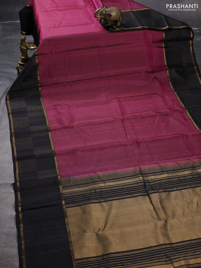 Pure soft silk saree magenta pink and black with allover zari woven strip pattern and long zari woven border