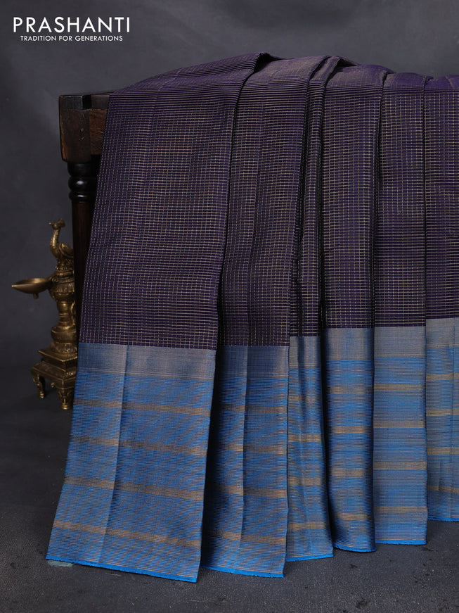Pure soft silk saree blue and cs blue with allover small zari checked pattern and long zari woven border