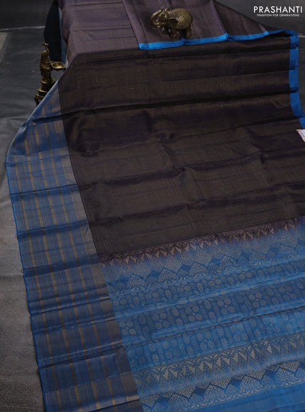 Pure soft silk saree blue and cs blue with allover small zari checked pattern and long zari woven border