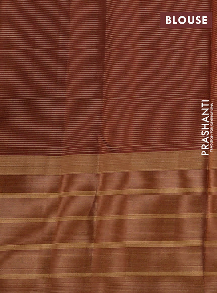 Pure soft silk saree dual shade of teal green and brown with allover small zari checked pattern and long zari woven border