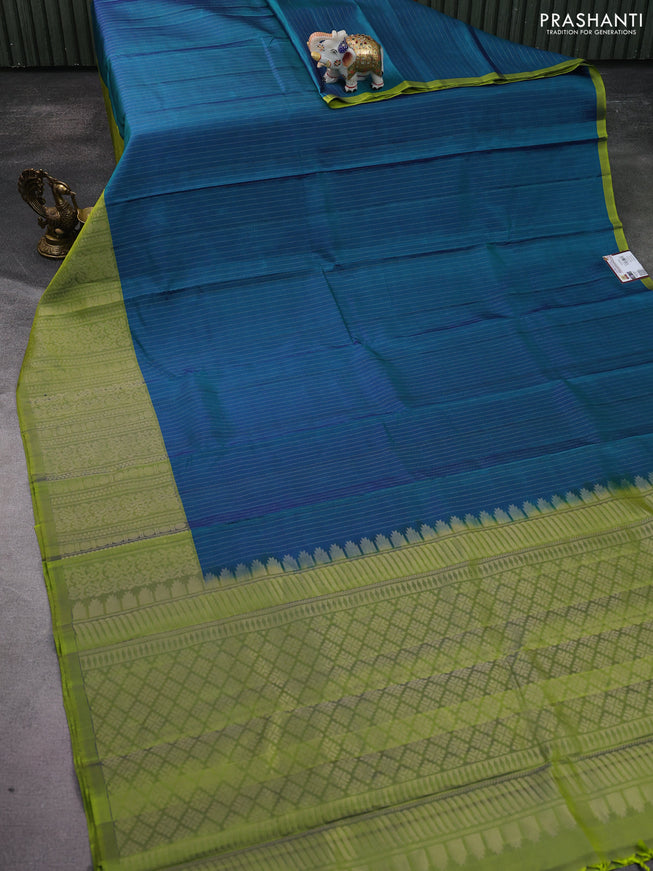 Pure soft silk saree dual shade of teal green and light green with allover zari woven strip pattern and long silver zari woven border