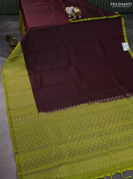 Pure soft silk saree wine shade and light green with allover zari woven strip pattern and long silver zari woven border
