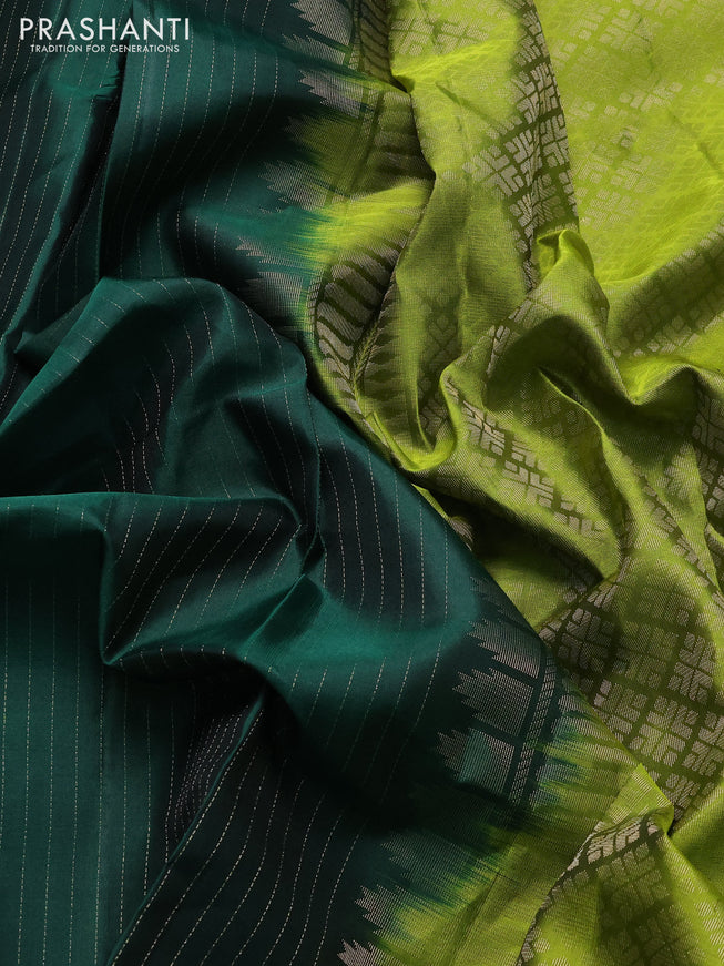 Pure soft silk saree bottle green and light green with allover zari woven strip pattern and long silver zari woven border