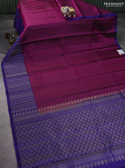 Pure soft silk saree purple and blue with allover zari woven strip pattern and long silver zari woven border
