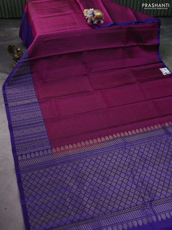 Pure soft silk saree purple and blue with allover zari woven strip pattern and long silver zari woven border