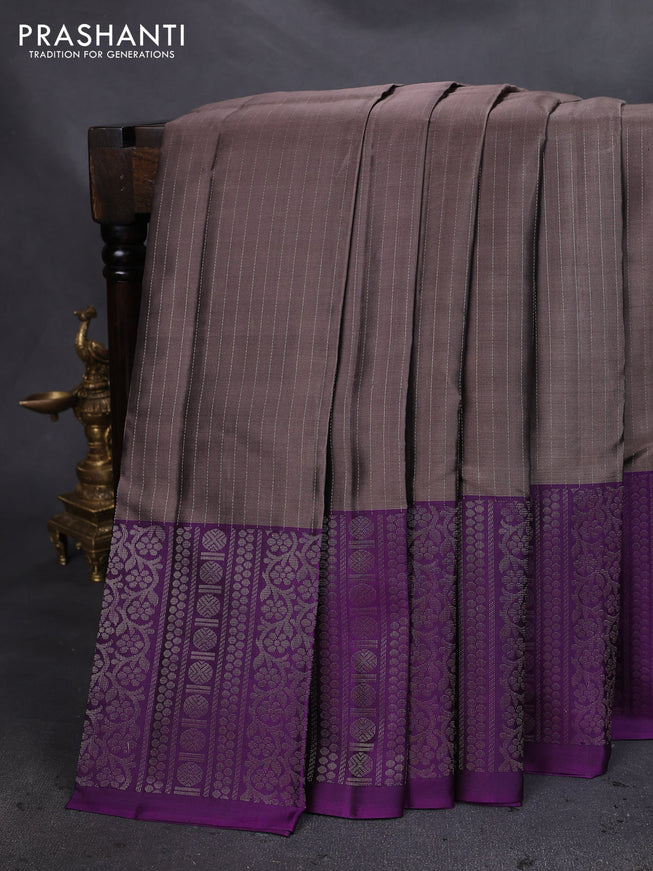 Pure soft silk saree grey shade and purple with allover zari woven strip pattern and long silver zari woven border
