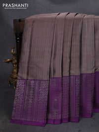 Pure soft silk saree grey shade and purple with allover zari woven strip pattern and long silver zari woven border