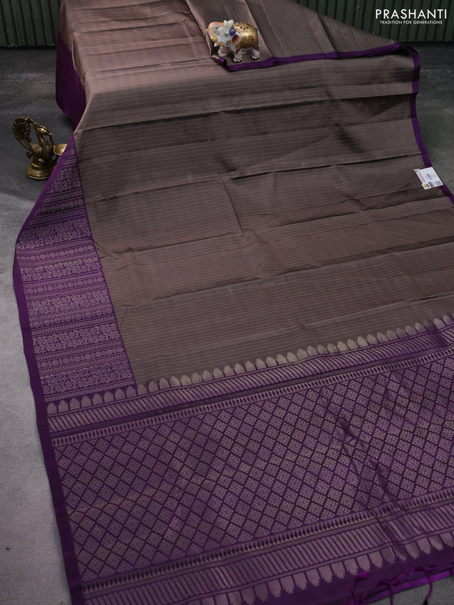 Pure soft silk saree grey shade and purple with allover zari woven strip pattern and long silver zari woven border