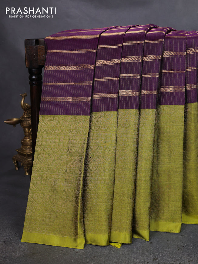 Pure soft silk saree purple and light green with allover zari strip pattern and long zari woven border