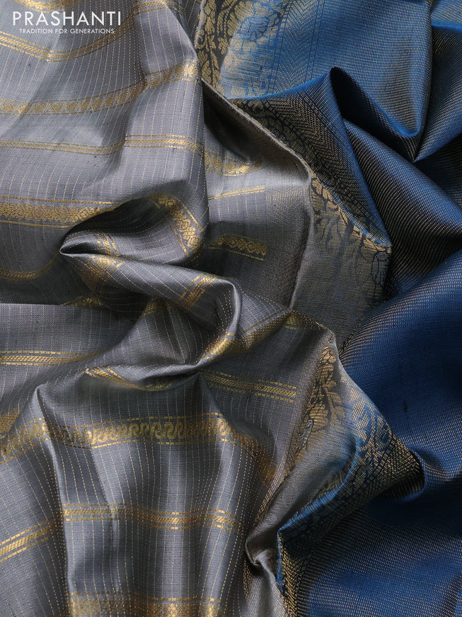 Pure soft silk saree grey and peacock blue with allover zari strip pattern and long zari woven border