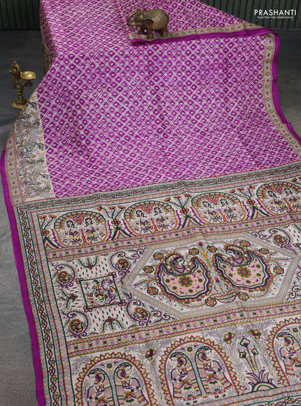 Printed silk saree purple and cream with allover shibori prints and madhubani printed pallu & border