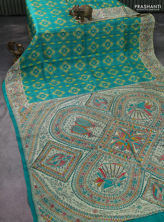 Printed silk saree teal green and cream with allover prints and madhubani printed pallu & border