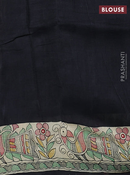 Printed silk saree black and cream with allover patola prints and madhubani printed pallu & border