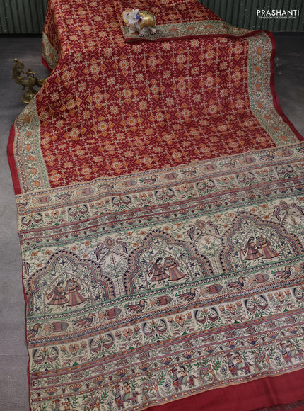 Printed silk saree maroon and cream with allover ikat prints and madhubani printed pallu & border