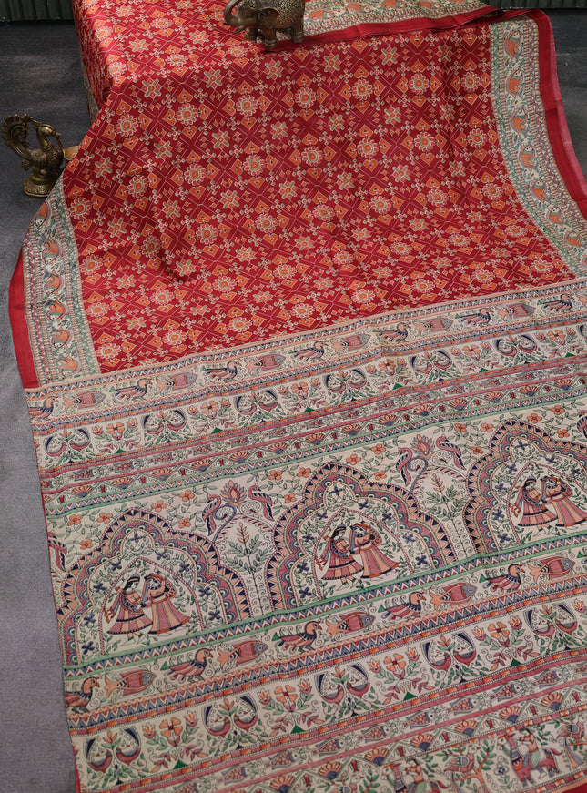 Printed silk saree red and cream with allover ikat prints and madhubani printed pallu & border