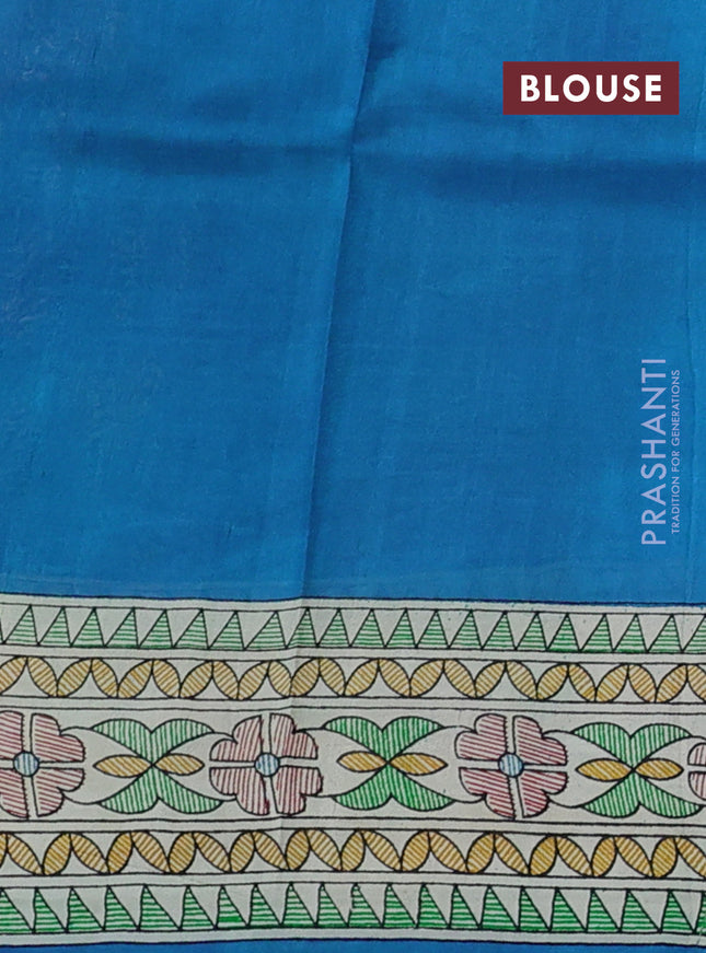 Printed silk saree cs blue and cream with allover patola prints and madhubani printed pallu & border