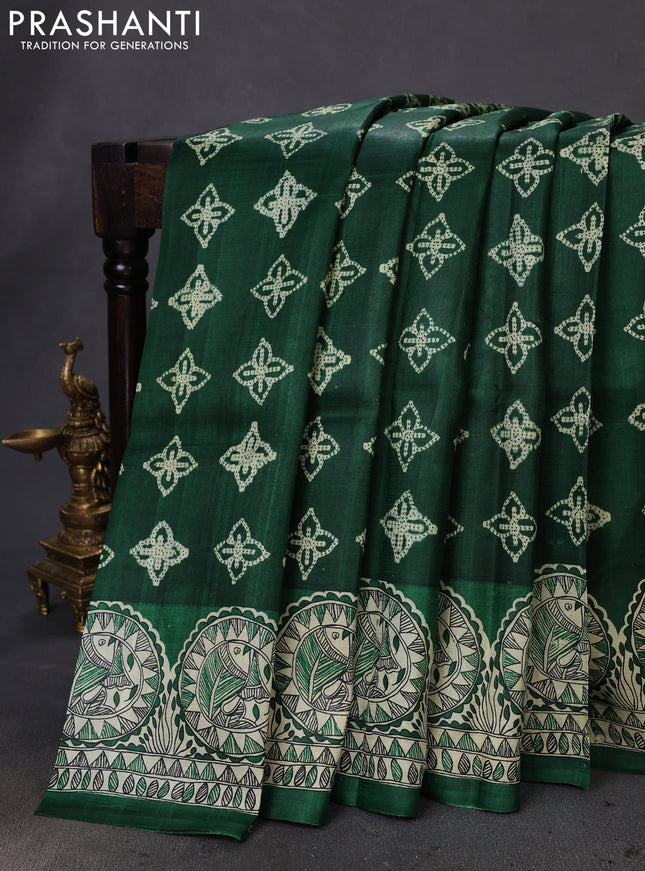 Printed silk saree green and cream with allover shibori prints and madhubani printed pallu & border