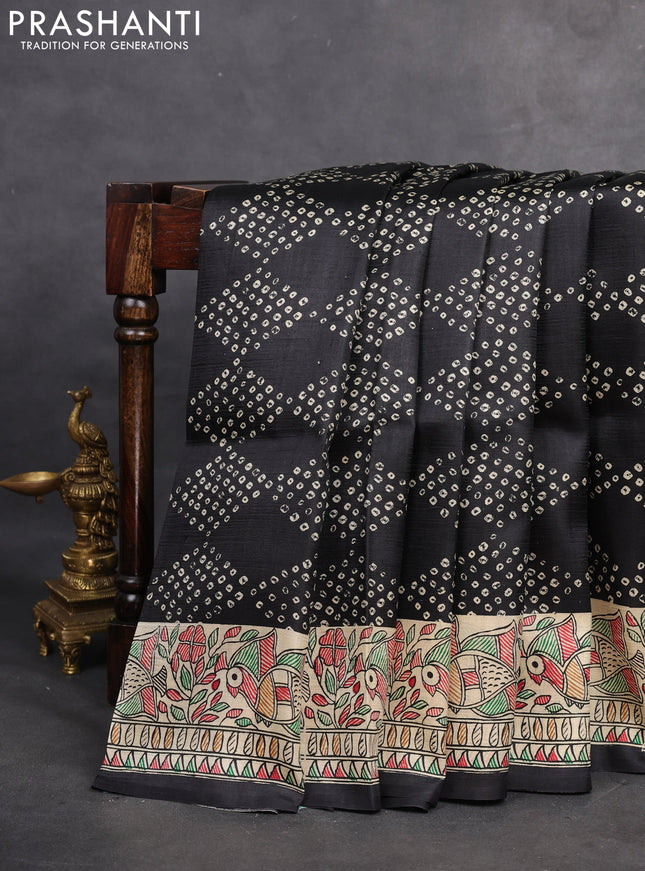 Printed silk saree black and cream with allover bandhani prints and madhubani printed pallu & border