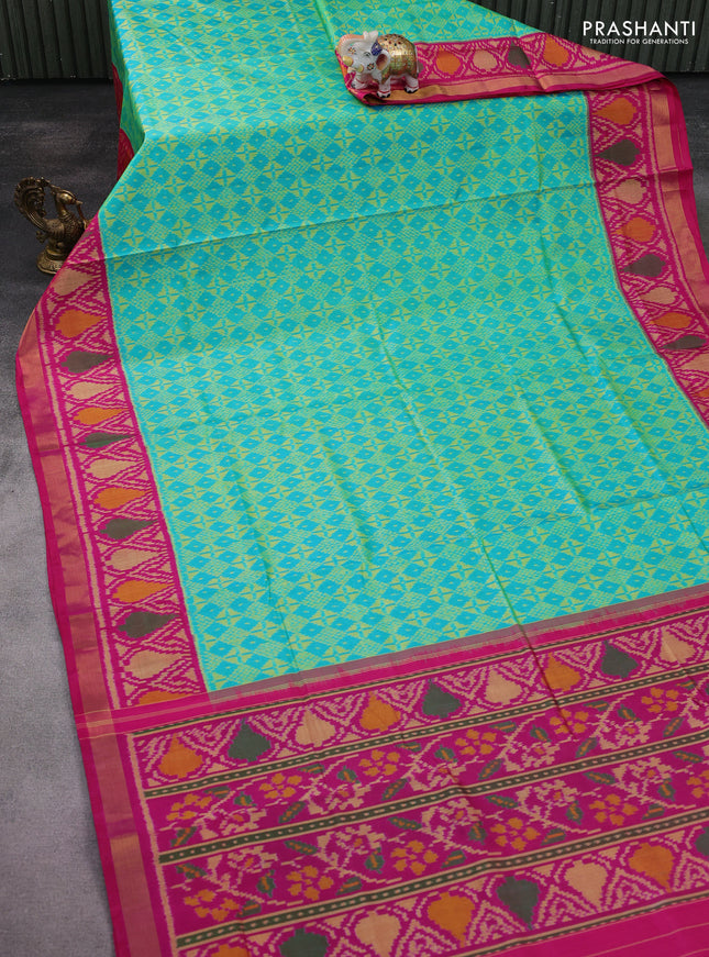 Rajkot patola silk saree dual shade of teal blue and pink with allover ikat weaves and ikat woven zari border