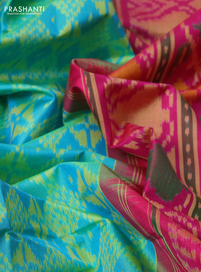Rajkot patola silk saree dual shade of teal blue and pink with allover ikat weaves and ikat woven zari border