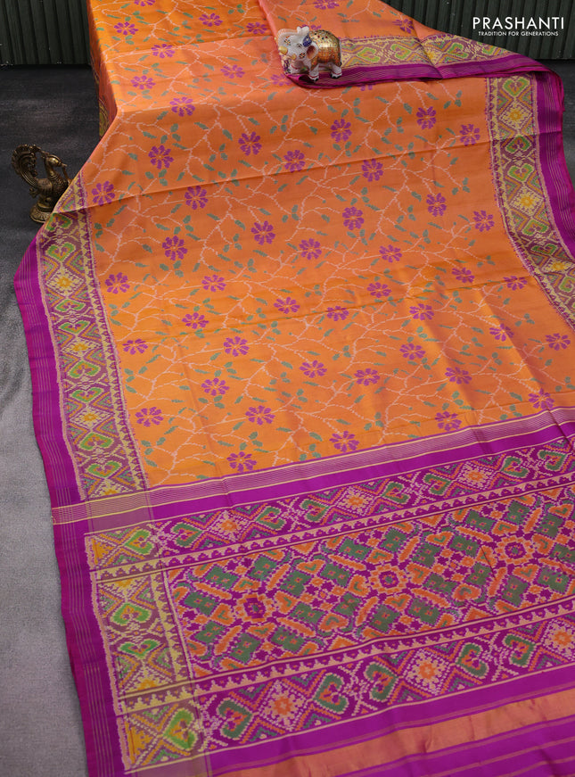 Rajkot patola silk saree orange and purple with allover ikat weaves and ikat woven zari border