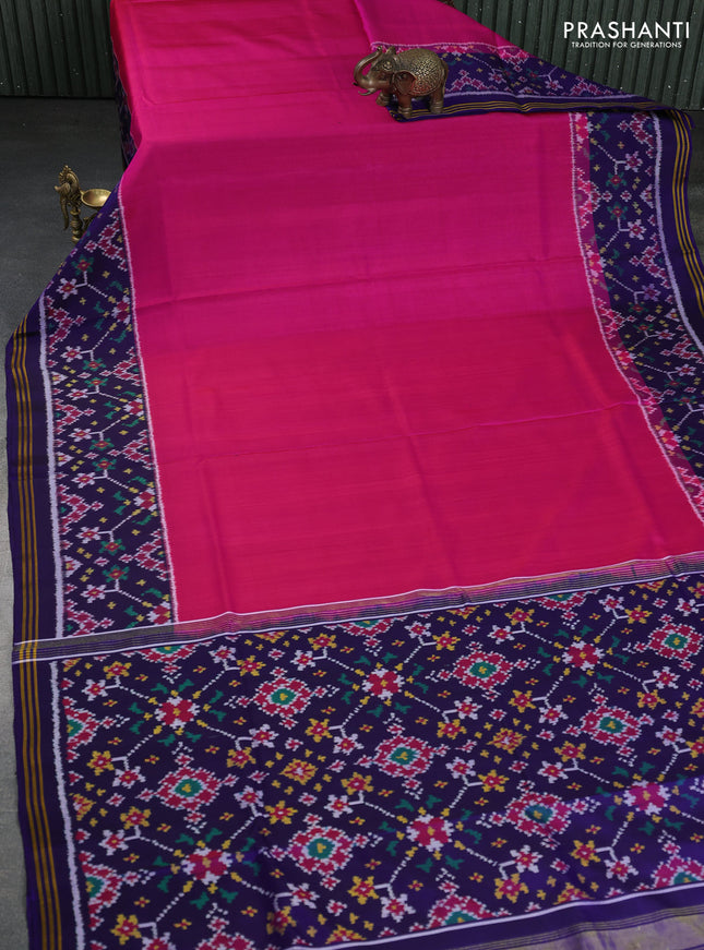 Rajkot patola silk saree pink and navy blue with plain body and long ikat woven border