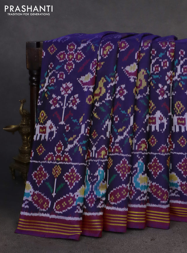 Rajkot patola silk saree navy blue and dual shade of purple with allover patola weaves and ikat woven border