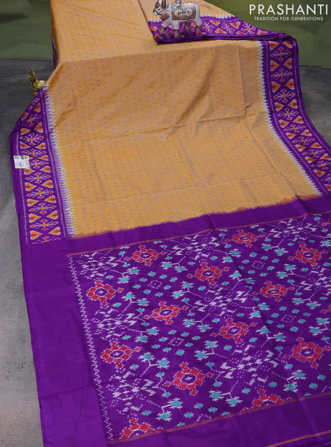 Pochampally silk saree sandal and violet with ikat butta weaves and ikat woven border