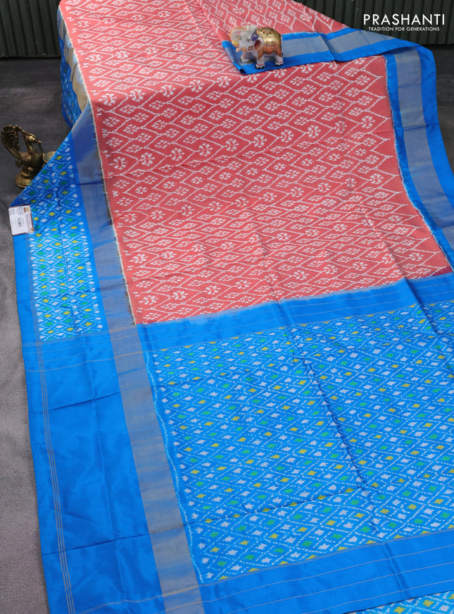 Pochampally silk saree peach orange and cs blue with allover ikat weaves and long ikat woven zari border