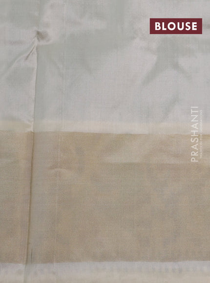 Pochampally silk saree green and cream with ikat butta weaves and ikat woven zari border