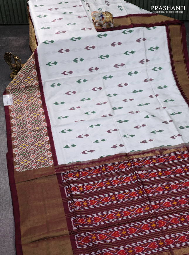 Pochampally silk saree off white and wine shade with ikat butta weaves and long ikat woven border