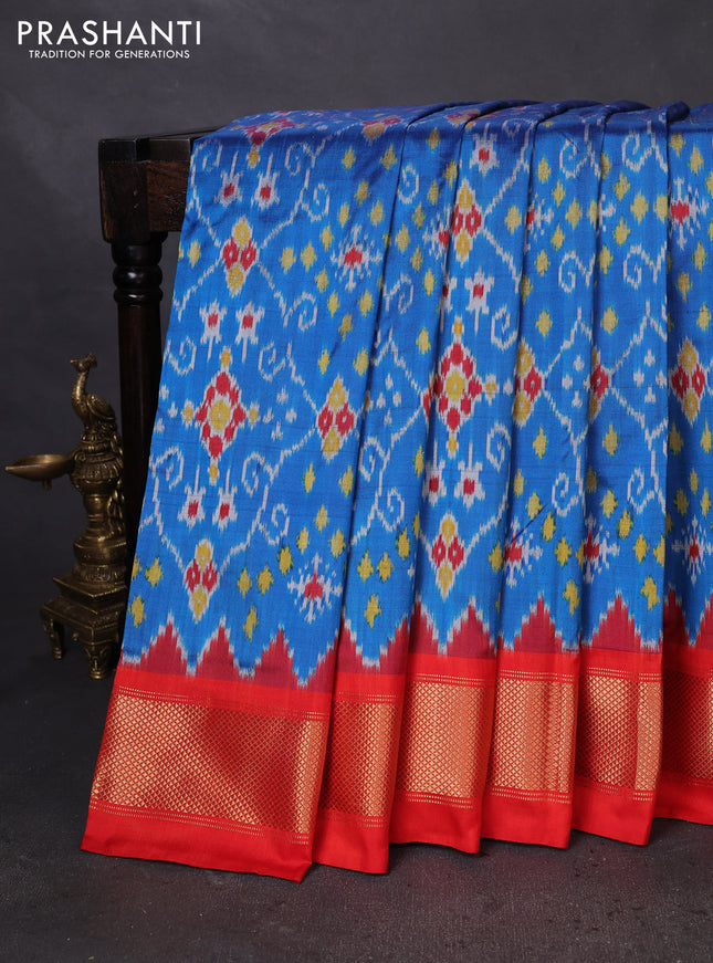 Pochampally silk saree cs blue and orange with allover ikat weaves and zari woven border